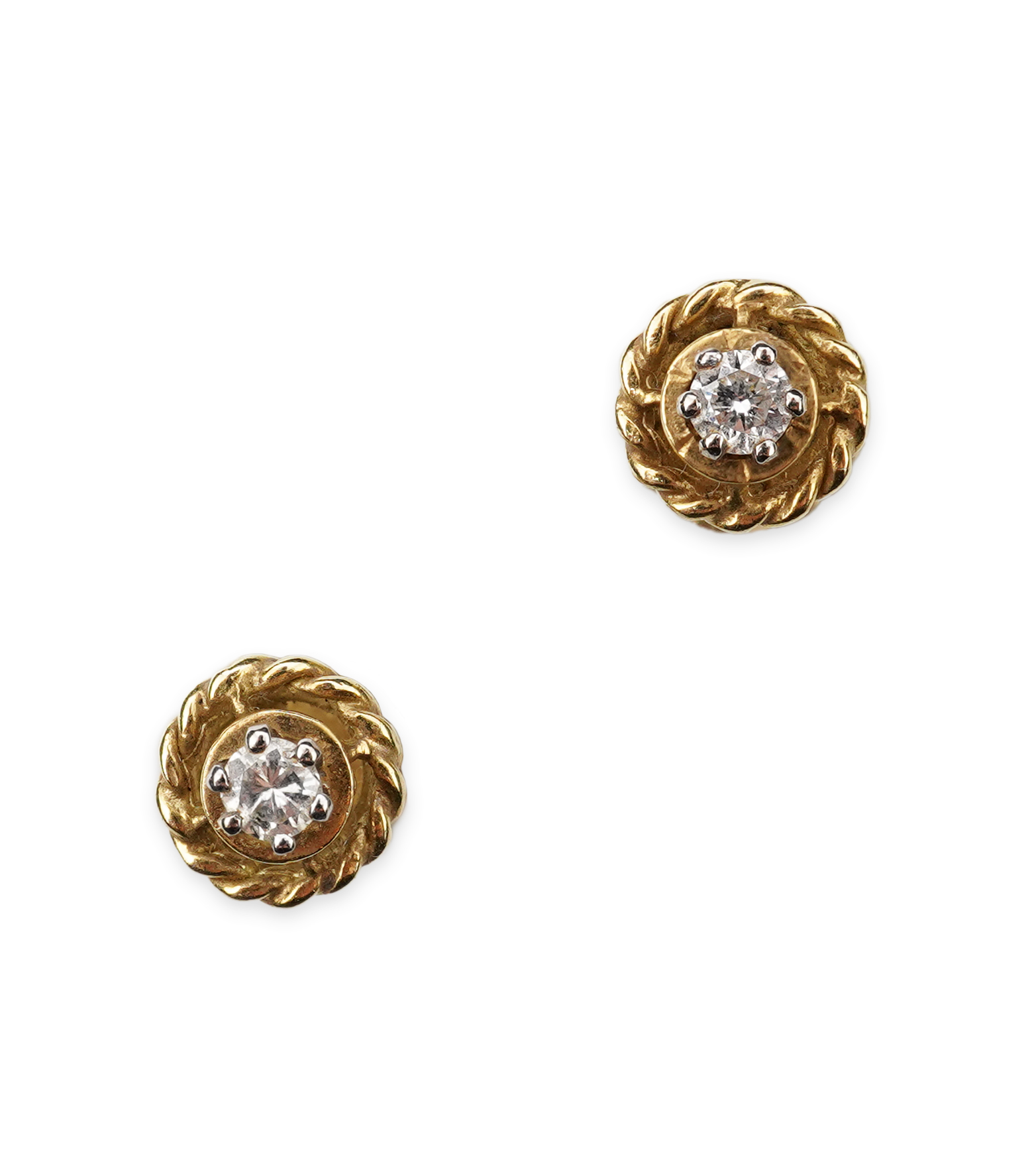 A pair of diamond stud earrings
